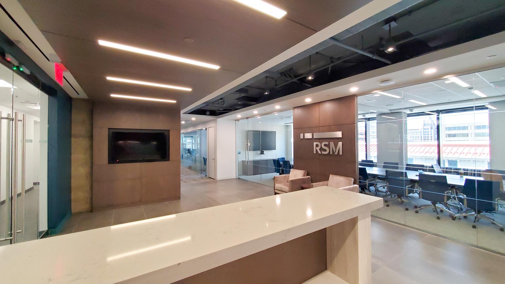 Spacious reception area adjacent to flexible meeting room